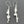 Load image into Gallery viewer, Torn spiral drop earrings - silver sparkle

