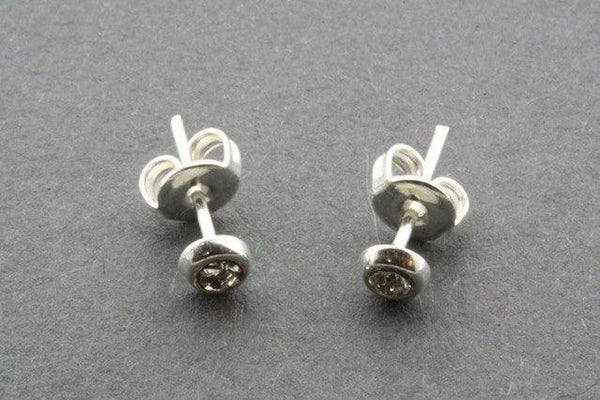 small clear stone stud