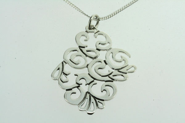 swirl cutout pendant on 60cm link chain - Makers & Providers