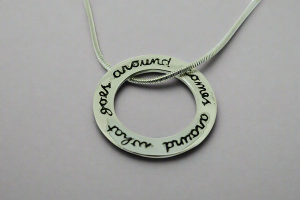 what goes around pendant on 45cm snake chain - Makers & Providers