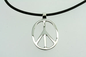 oval peace pendant on black leather - Makers & Providers