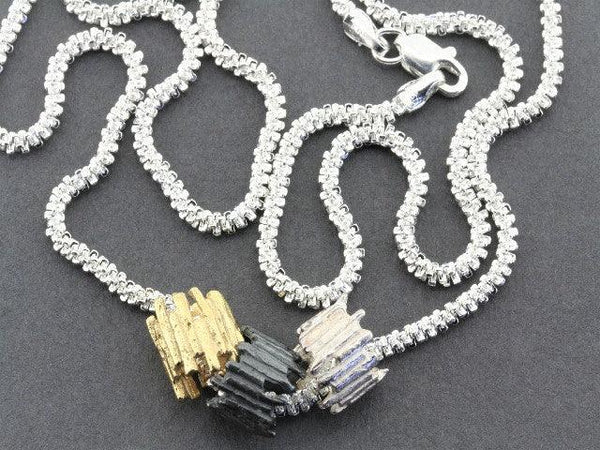 Tubular sticks pendant - Silver , Gold Oxidized on 45 cm chain