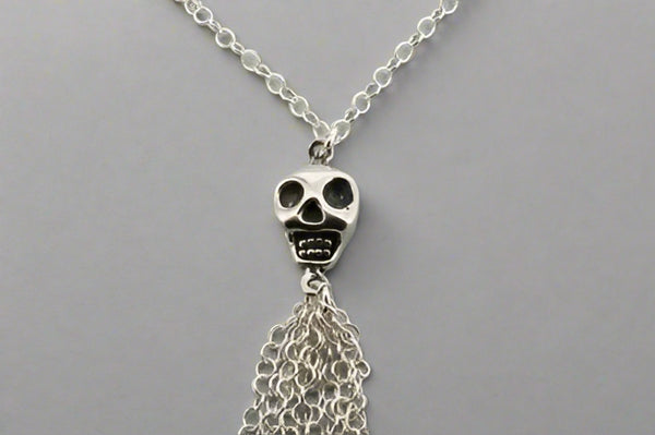 skull & tassle necklace - Makers & Providers