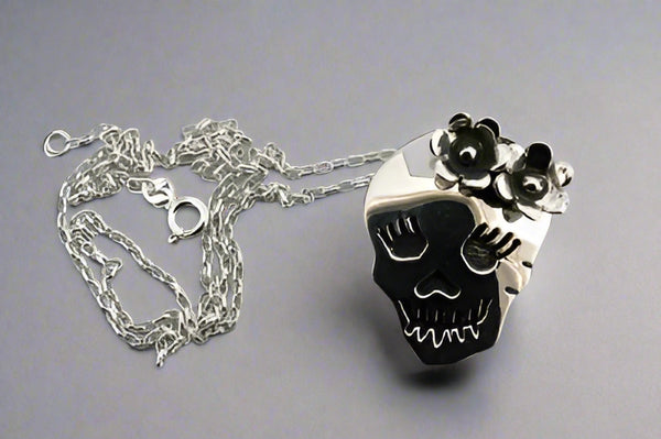 skull & flower pendant on 50cm oval link chain - Makers & Providers