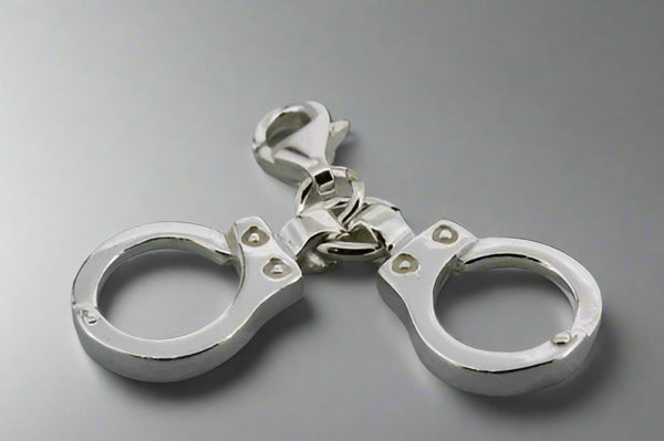 handcuff charm - Makers & Providers