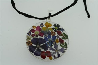 flower/resin pendant - circle on black silk - Makers & Providers