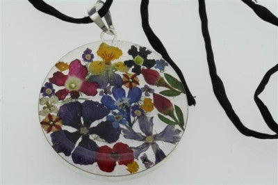 flower/resin pendant - circle on black silk - Makers & Providers