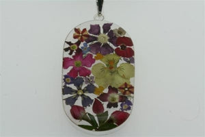 flower/resin pendant - cylinde on black silk - Makers & Providers