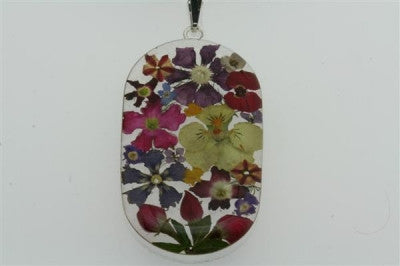 flower/resin pendant - cylinde on black silk - Makers & Providers