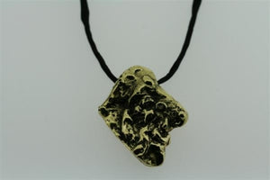 nugget pendant - brass on black silk - Makers & Providers