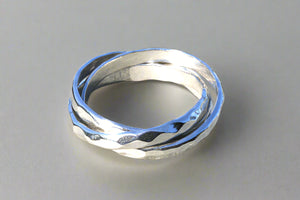 sterling silver Russian wedding ring with a hammered treatment