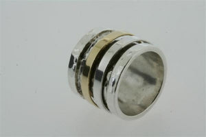 silver/brass battered spinner ring - Makers & Providers