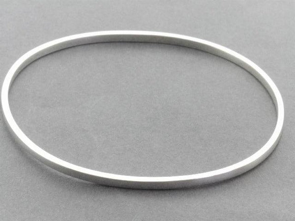narrow square edged oval bangle - sterling silver - Makers & Providers
