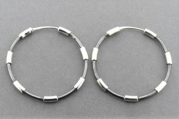 ox and polished silver large hoop - Makers & Providers