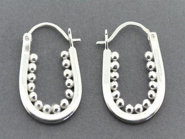 silver hoop earring