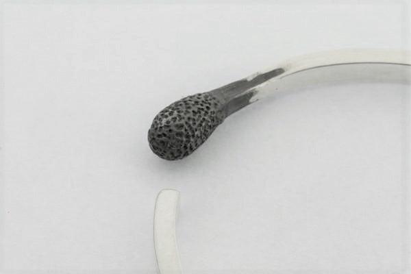 quirky sterling silver bangle