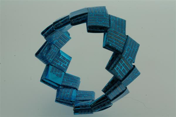 recycled bracelet - small - blue text - Makers & Providers