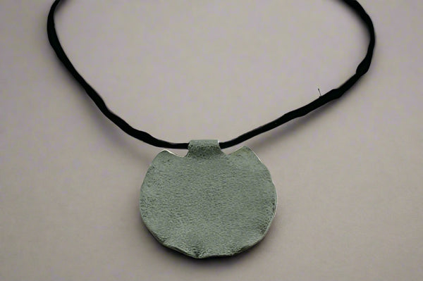 shield pendant on black silk thread necklace - Makers & Providers