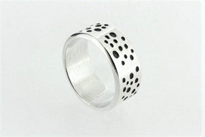 silver ring with organic oxidized spots
