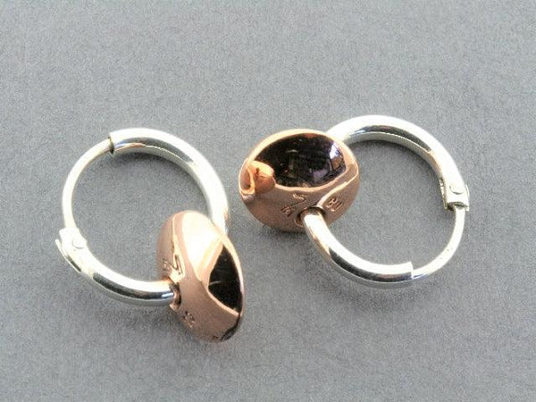 silver hoop with copper disc