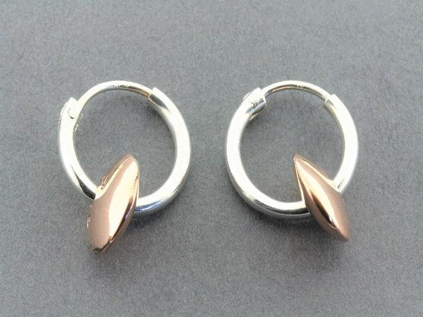 silver hoop with copper disc