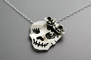 skull & flower pendant on 50cm oval link chain - Makers & Providers