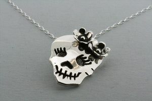 skull & flower pendant on 50cm oval link chain - Makers & Providers