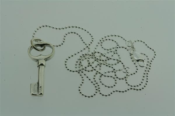 small key pendant on 55cm ball chain
