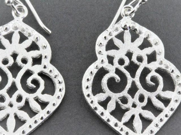 Beaded floral shield earring - Makers & Providers