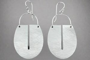 floating full shield earring - Makers & Providers