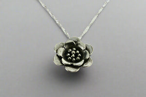 small sunrose pendant on 55cm singapore chain - Makers & Providers