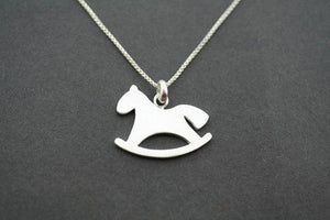 rocking horse necklace - Makers & Providers