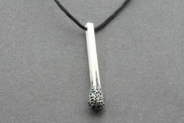 Burnt match on string necklace - Makers & Providers