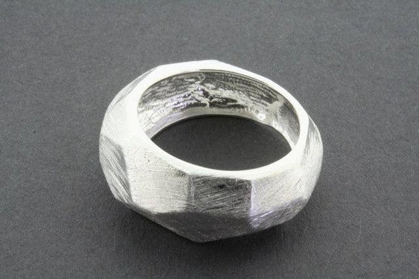 narrow faceted scratched ring